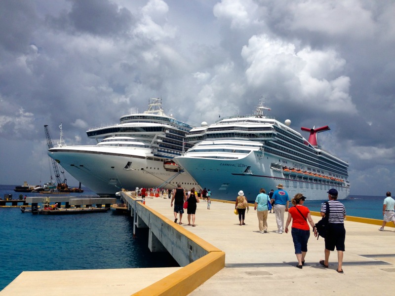 two cruise ships docked in the caribbean 