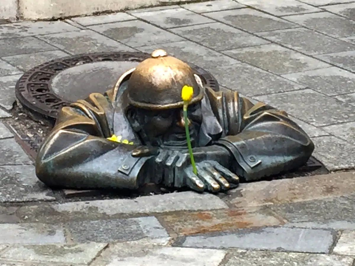 touring-bratislava-viking-river-cruise-cumil-the-worker-statue-on-the-ground