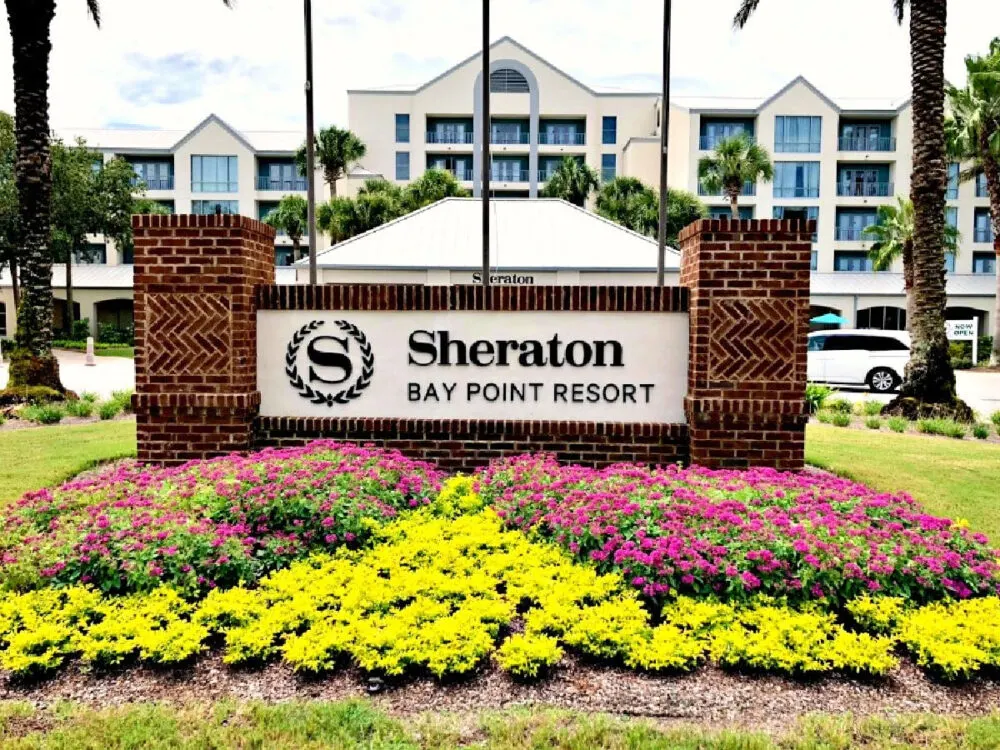 sheraton-bay-point-sign-and-flowers