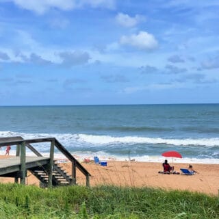 restaurant-guide-to-ormond-beach-sitting -on-sand